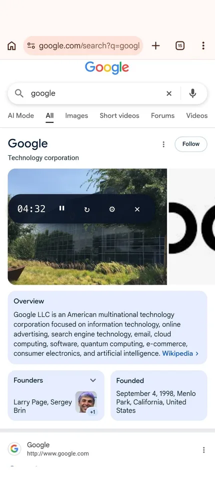 The pill expanded over another app, showing pause, restart, settings and close buttons